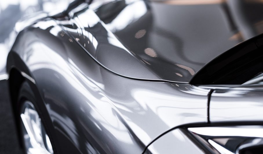close up view of luxury shiny car in auto salon