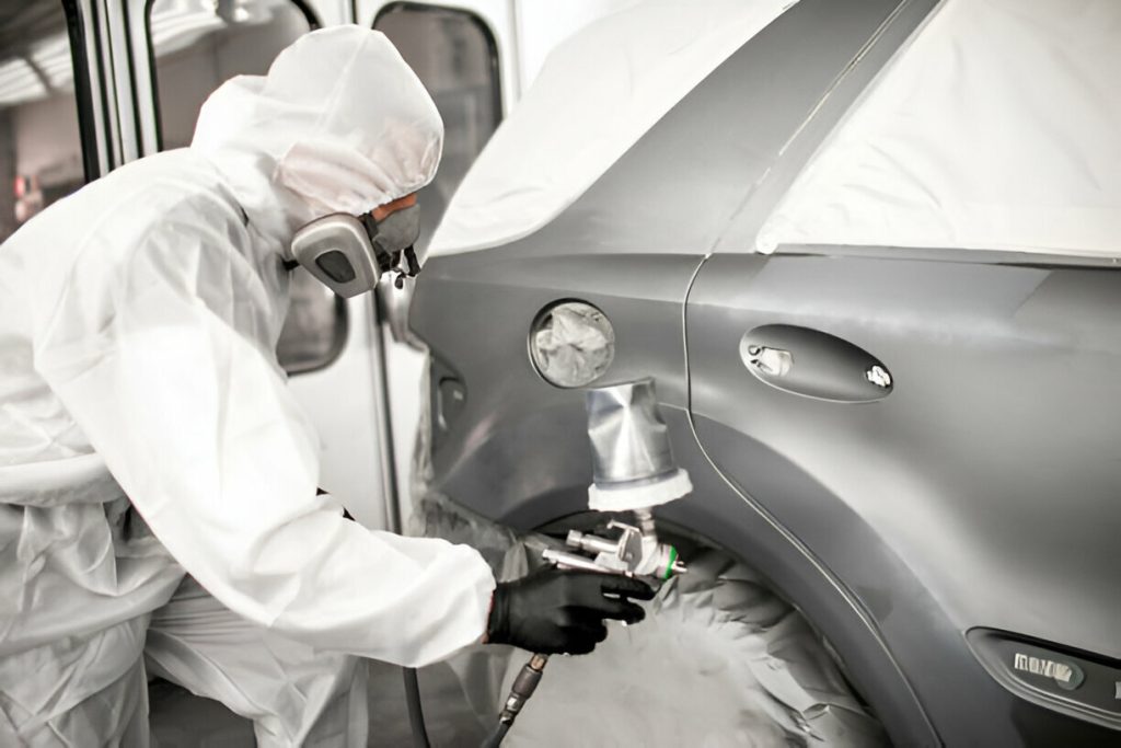 Fleet and rental vehicles receiving paintless dent repair."